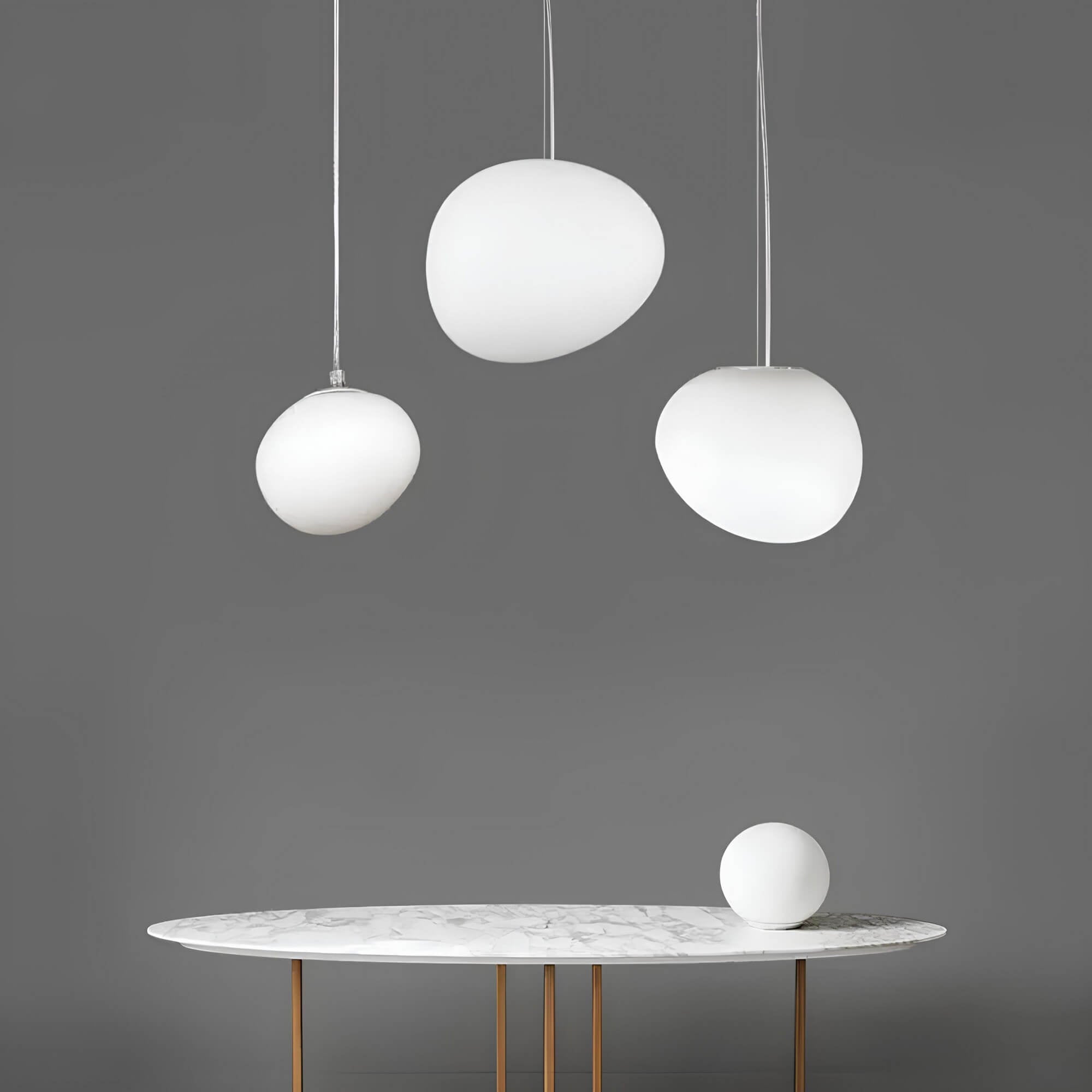 haloglow-runde-glas-hangeleuchte-klar-rauchglas-minimalistisches-design-wohnzimmer-beleuchtung-xlumina4
