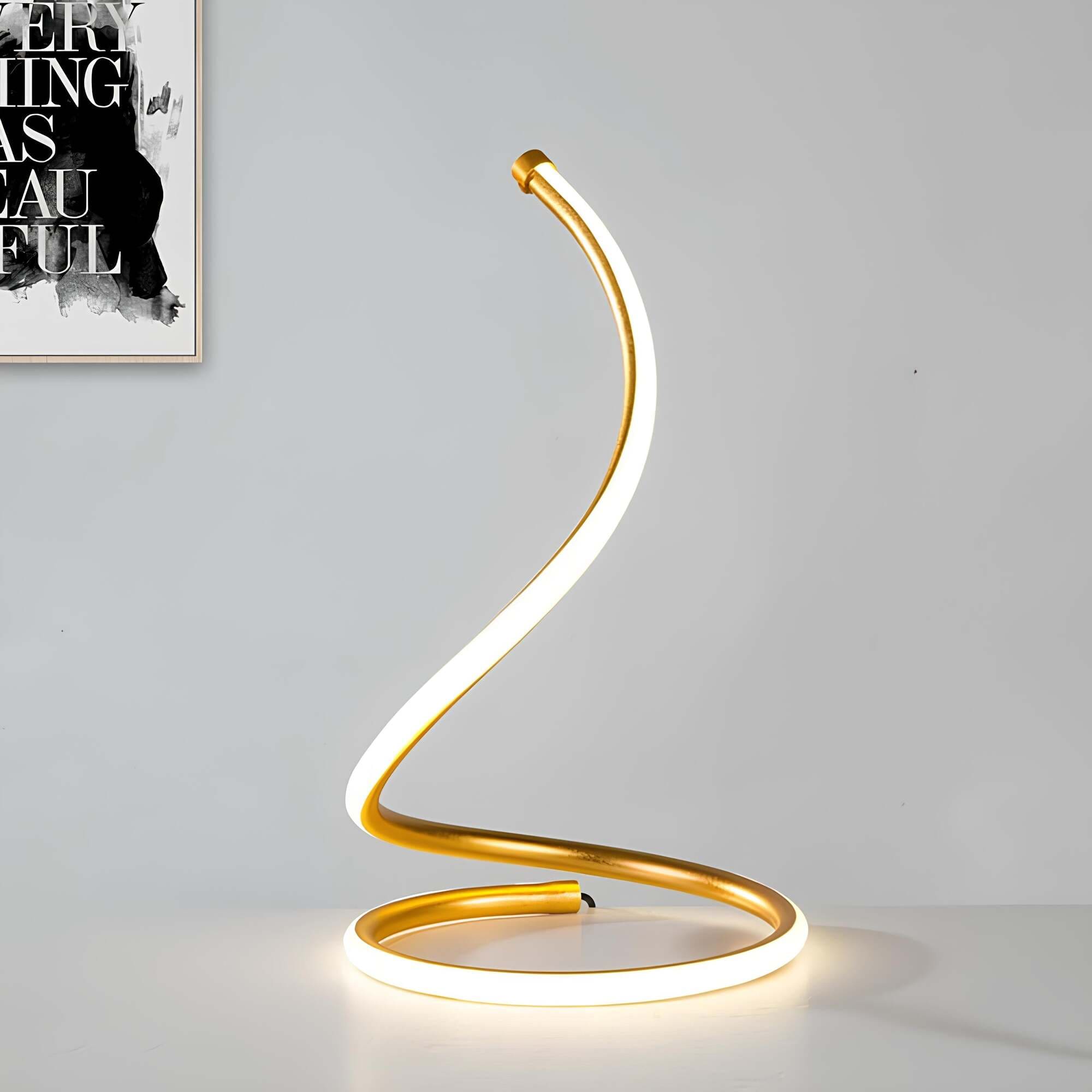 glowspiral-goldene-led-tischlampe-modern-spiralförmig-lichtquelle-wohnzimmer-xlumina